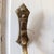 A striking pair of vintage French bronze curtain tiebacks featuring sculptural curved arms and distinctive architectural...