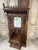 Neo-gothic style oak coat rack circa 1900. Carved with window frames, pinnacles, etc., representing gothic features. A...