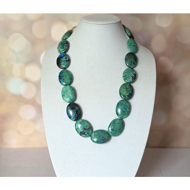 Discover an extraordinary vintage statement necklace believed to be of Native American origin, handcrafted from...