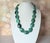 Discover an extraordinary vintage statement necklace believed to be of Native American origin, handcrafted from...