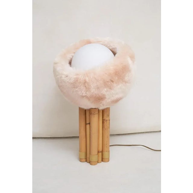 Dynamite table lamp by patricia bustos de la torre dimensions: d 32 x w 35 x h 52 cm. Materials: white opal glass, rattan...