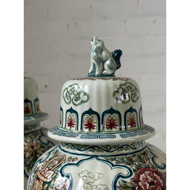 This exquisite pair of ginger jars is a testament to the artistry of the Royal Boch factory in Belgium. Dating back to the...