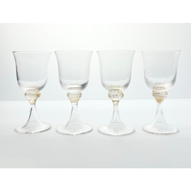Murano Torcée 4 Wine Glasses 6” 6oz Swirl Optic Hand Blown 24k Gold Flakes Italy Good condition. No chips, cracks, or...