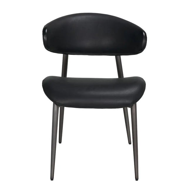 The Hakone Chair blends sleek industrial design with refined comfort. Featuring a graphite black leather seat and a sturdy...