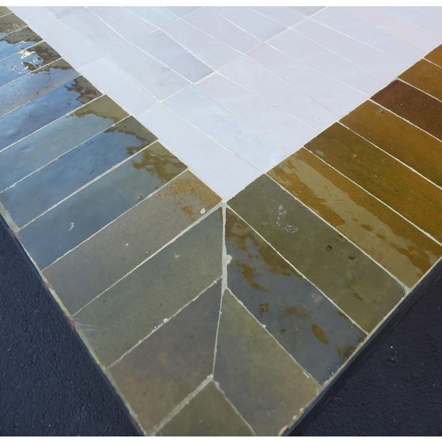A new arrival. 100 % glazed rectangular. Honey mustard and white Moroccan mosaic dining table measuring approximately 28"...