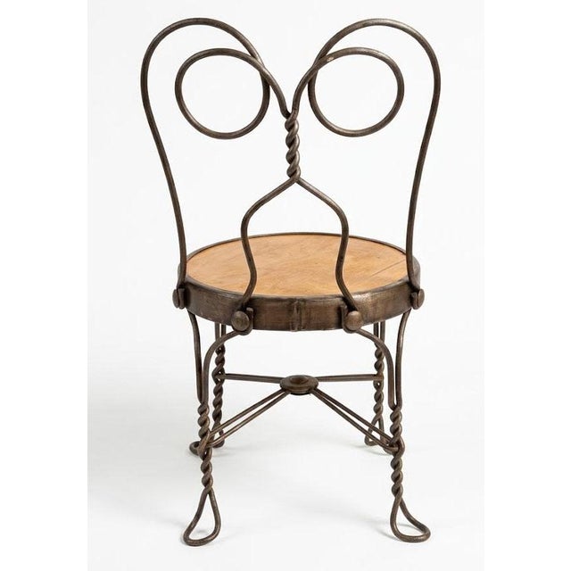 _ Bring historic charm to your space with this authentic vintage miniature ice cream parlor chair, styled after the iconic...