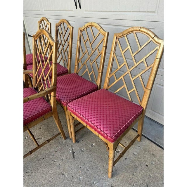 Offered is a set of 6 vintage chinoiserie style dining chairs by Century Furniture. This set features a faux bamboo frame,...