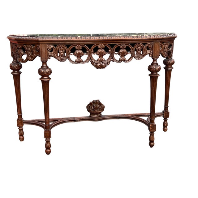 Jacobean Revival Marble-Top Console Table An impressive Jacobean Revival console table featuring a richly carved hardwood...