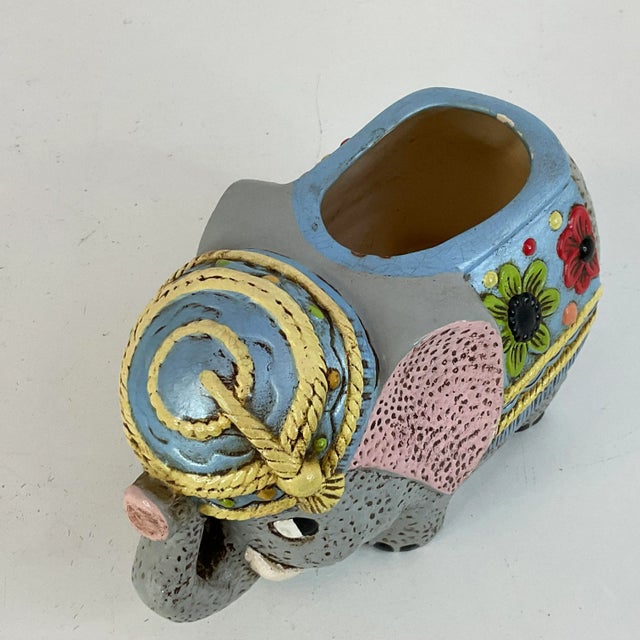 Vintage Home is pleased to offer this adorable Americana Folk Art ceramic planter from 1978. The little elephant is...