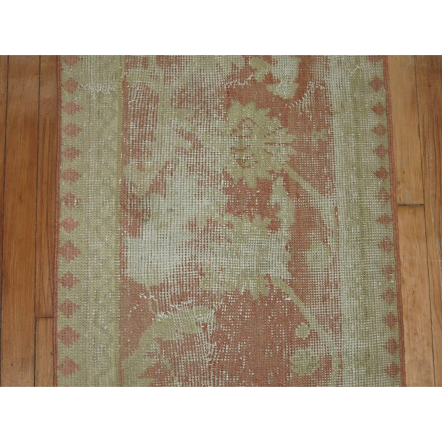 Turn of the 20th century Antique Turkish Oushak runner in soft pink 2' x 8'6'' Antique Turkish Oushak runners such as...
