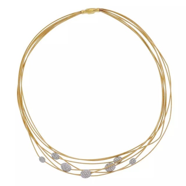 This chic authentic necklace is by Marco Bicego from the Cairo Collection, crafted from 18k yellow and white gold...