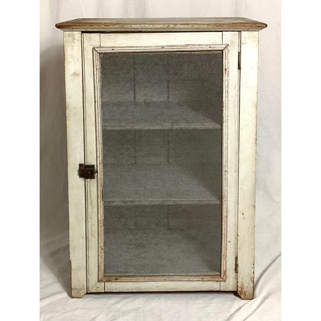 Early American Primitive Pie Safe Cupboard Charming early American pie safe in old white paint with three mesh sides and a...