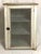 Early American Primitive Pie Safe Cupboard Charming early American pie safe in old white paint with three mesh sides and a...