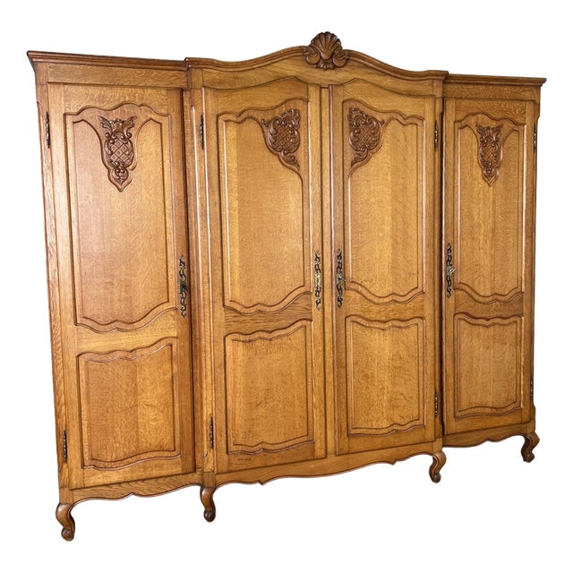 Vintage French Louis XVI Style Carved Oak 4-Door Wardrobe For Sale