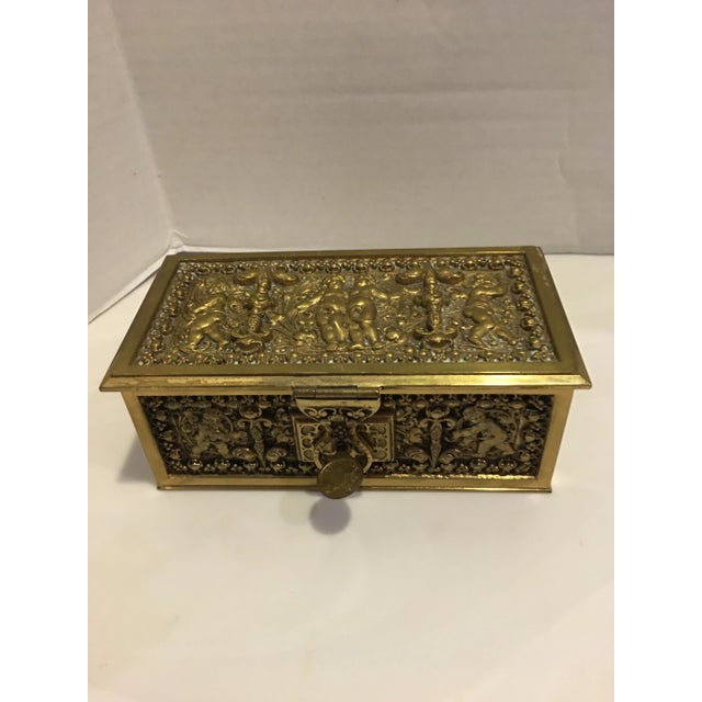 Exquisite rectangular hinged box by Erhard & Sons , Germany. Large gilded bronze box with original key with lion brand....