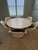 Straight from the height of 1960s design innovation, this rare mid-century modern dining set by Maurice Burke for Arkana...