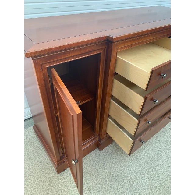 This Stanley Buffet has a distinct style. Features two spacious cabinets, four large dovetail center drawers. Custom...
