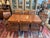 Design Plus Gallery presents an Ethan Allen Solid Cherry Dining Table with Eight Slat-Back Dining Chairs. This coordinated...
