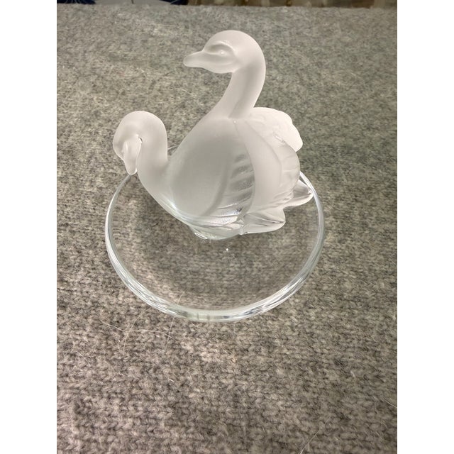 Authentic Lalique France Deux Cygnes frosted and clear crystal ring dish and trinket tray. Designed by Marc Lalique, this...