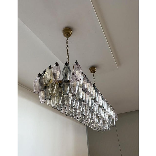 Elegant italian chandelier made from 138 beautiful murano multicolored glasses "poliedri". Structure in gold and brass...