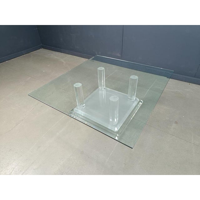Lovely acrylic glass column and clear beveled glass top coffee table. Thick acrylic glass base. Good condition. 1970s -...