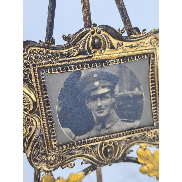 I am offering an original antique photo frame from the turn of the 19th and 20th centuries, made of cast metal...