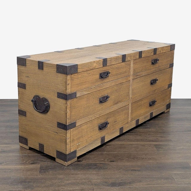 This Restoration Hardware dresser features a sturdy wood build with industrial metal accents. It offers six spacious...
