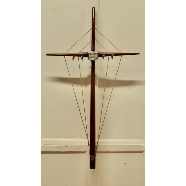 Quirky wall hanging hat and coat rack on a nautical theme. A great looking piece made from decorative dingy parts in Teak,...