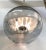 Sculptural 1970s glass pendant light from Murano by Italian lighting company Sothis. The globe shade is hand blown in...