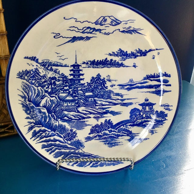 Classic blue and white large chinoiserie plate depicting the Japanese countryside. Great on a wall or table.