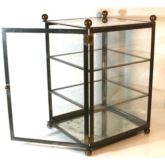 Hollywood Regency Glass Brass & Metal Square Tabletop Display Cabinet This brass, metal & glass vitrine was produced in...