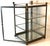 Hollywood Regency Glass Brass & Metal Square Tabletop Display Cabinet This brass, metal & glass vitrine was produced in...