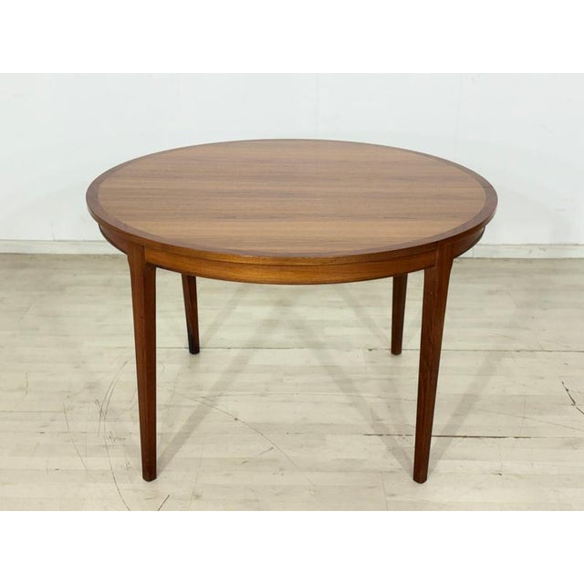 This beautiful round vintage dining table, crafted from high-quality teak, is an outstanding example of 1960s Scandinavian...