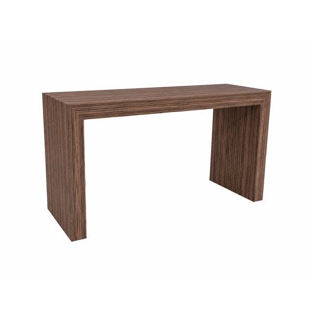 Custom made console done in a zembrano finish. The console has clean lines. The dims are 34" tall 5' long and 20" deep....