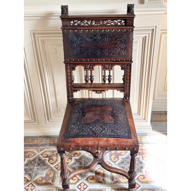 Set of 3 magnificent antique French Henri II dining chairs, hand-carved from solid walnut with richly detailed lion head...