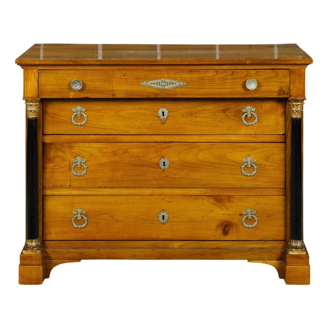 Early 19th Century French Empire Fruitwood Four-Drawer Commode with Ebonized Corinthian Columns For Sale