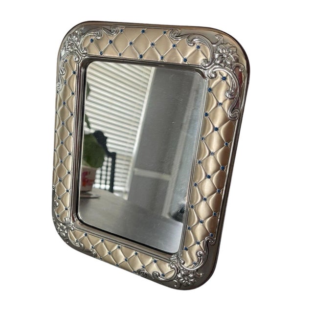 Elegant Italian sterling silver picture frame that also functions as a tabletop mirror, crafted by Leader Argent in the...