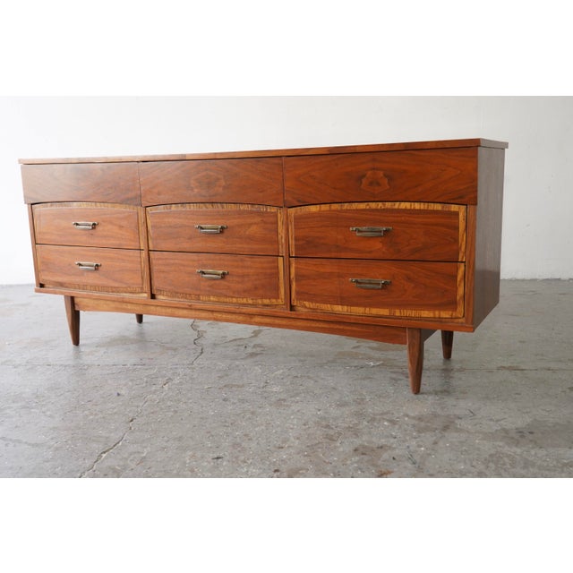 Stunning Vintage Two-Tone Mid-Century Modern Walnut Dresser Upgrade your space with this gorgeous Mid-Century Modern...