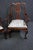 Chippendale style mahogany claw & ball foot arm chais with newer paisley upholstery