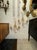 This listing features a pair of elegant sconces inspired by Maison Bagues design. The sconces are adorned with exquisite...