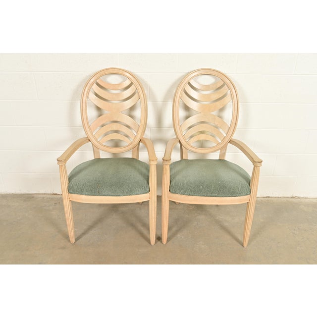 An outstanding pair of modern Art Deco style armchairs or dining captain chairs By Henredon USA, Circa 1980s Carved...