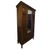 A refined Arts and Crafts oak wardrobe armoire, executed in a restrained, architectural form characteristic of early 20th-...