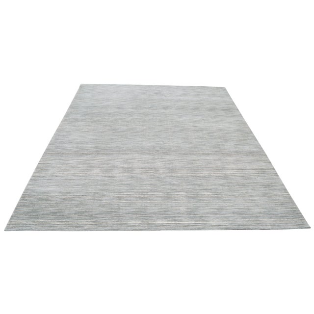 Vintage Turkish Anatolian Oushak hand knotted rug with natural colors, soft texture and fine weave.