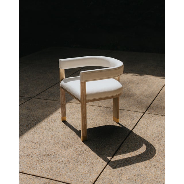 New special order item. Not vintage. The Jude barrel back dining chair makes a dramatic statement from every angle....