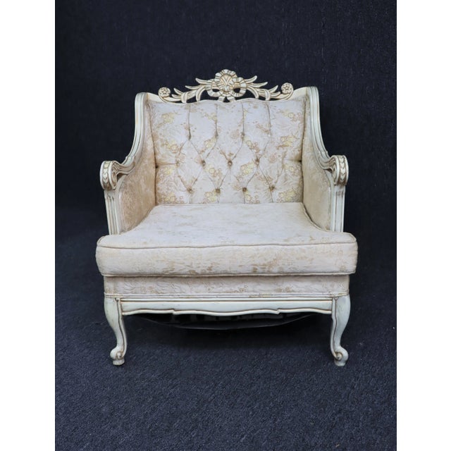 Louis XV style club chair , solid wood frame with ribbon carved crest , cream painted finish with gold highlights, off...
