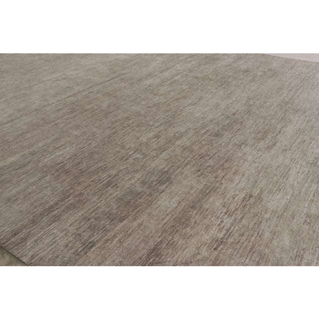 Rug & Kilim’s Oversized Modern Textural Rug in Brown, Gray and Beige Striae Description: A 10x18 oversized bold new...