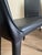 These chairs are in like new condition. Less than a year old, barely ever sat in. Bought new at DWR. 4 Chairs in Black...
