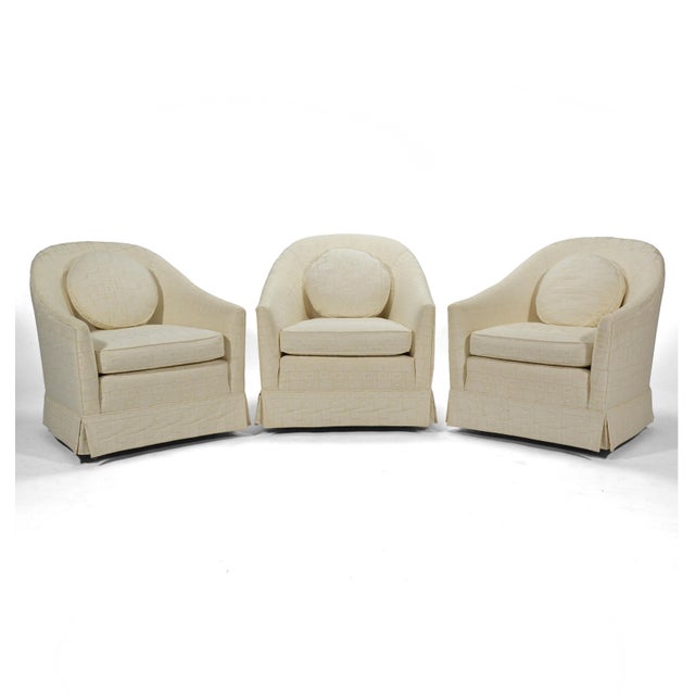 These barrel back lounge chairs by Harvey Probber are elegantly proportioned and perfectly scaled. The skirt conceals...