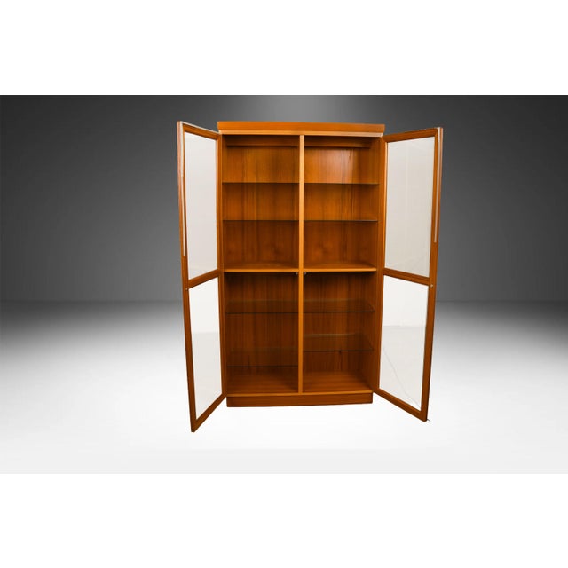 Mid-century teak lighted display / China Cabinet by Skovby Mobelfabrik A/S, Minimalist Danish Modern inspired profile....