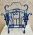 Vintage Mid Century Blue Enameled Scrolled Iron and Flowers Magazine Rack Such a treasure in a beautiful color! One of a...
